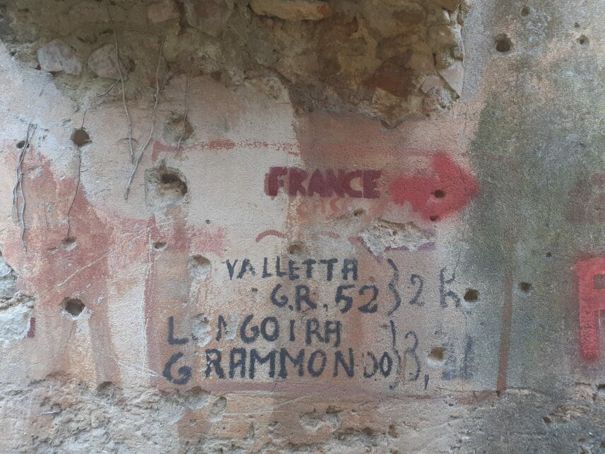 Informal markings on a wall in the borderlands between France and Italy, 2021.