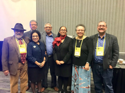 was a photo taken on the day of the panel, Roberto R. Alvarez is 3rd man from the left. Maria Luz Torres gave me her permission via email. I'll forward it .Some of these were not presenters but attendees, celebrating Alvarez.
