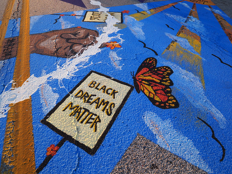 Photograph of a Black Lives Matter mural painted on a street.