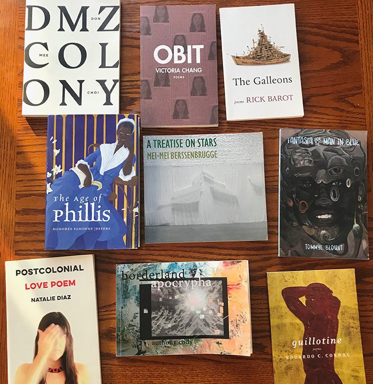 Photograph of books on a table.