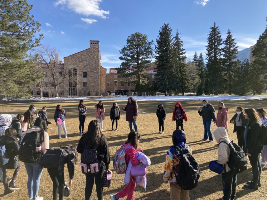 Photograph of a large group of people outdoors
