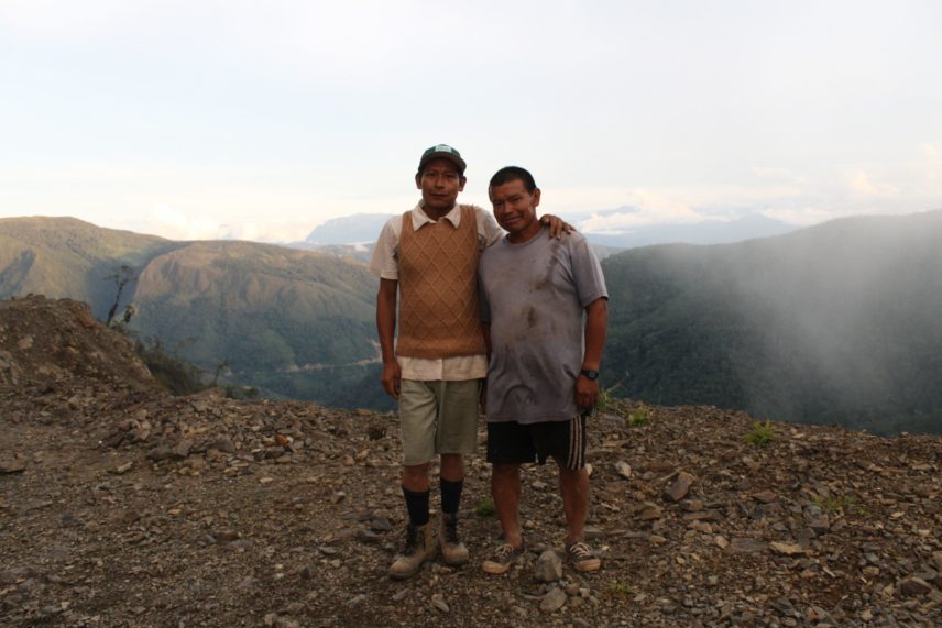 Photograph of two people outdoors