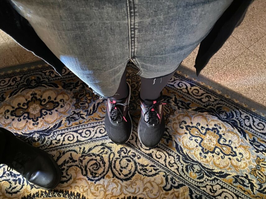 A photograph of a person's legs