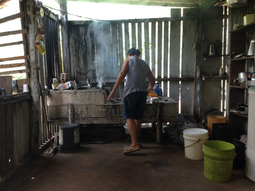Photograph of a woman in a kitchen
