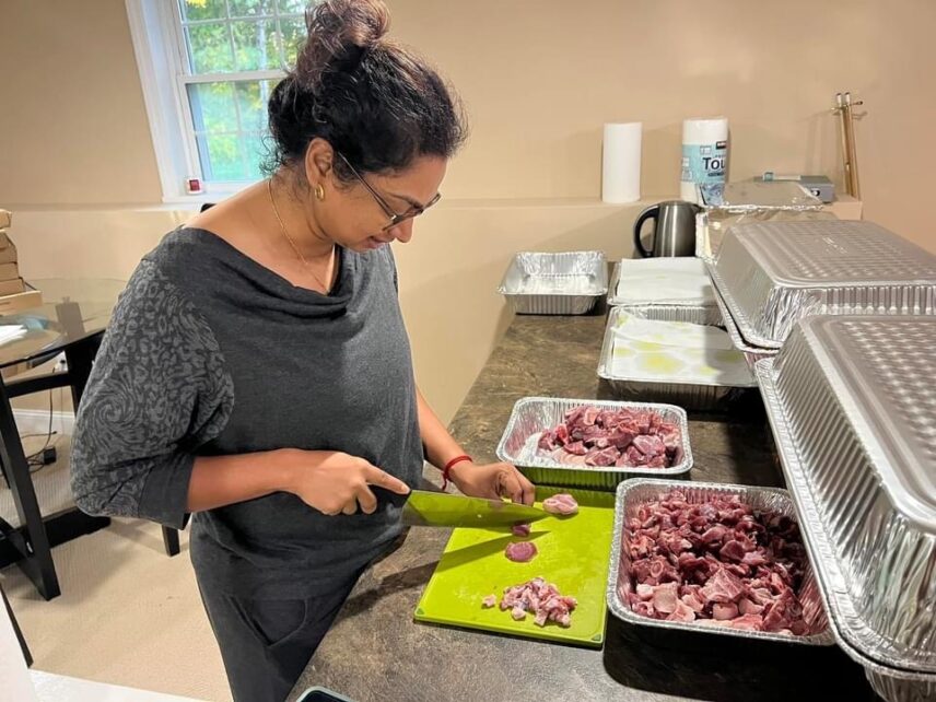 Thurka preps mutton at Karthika’s house before a big family celebration.